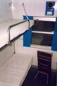 Inside one of the air-conditioned 4-berth soft sleepers - the other two bunks are just out of shot to the right. In the centre is a folding table.